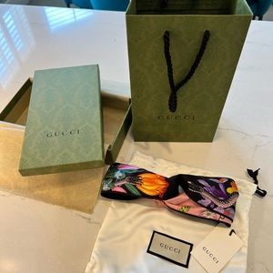 Authentic Gucci headband in snake flora snake print with tags and box.